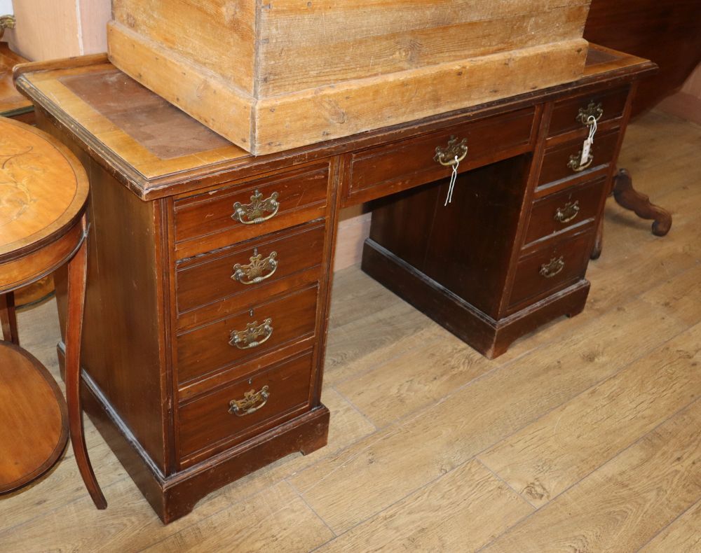 A late Victorian mahogany kneehole desk, W.146cm, D.61cm, H.81cm